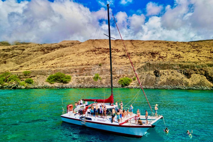 a small boat in a large body of water