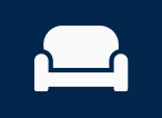 Simple white couch icon on a dark blue background.