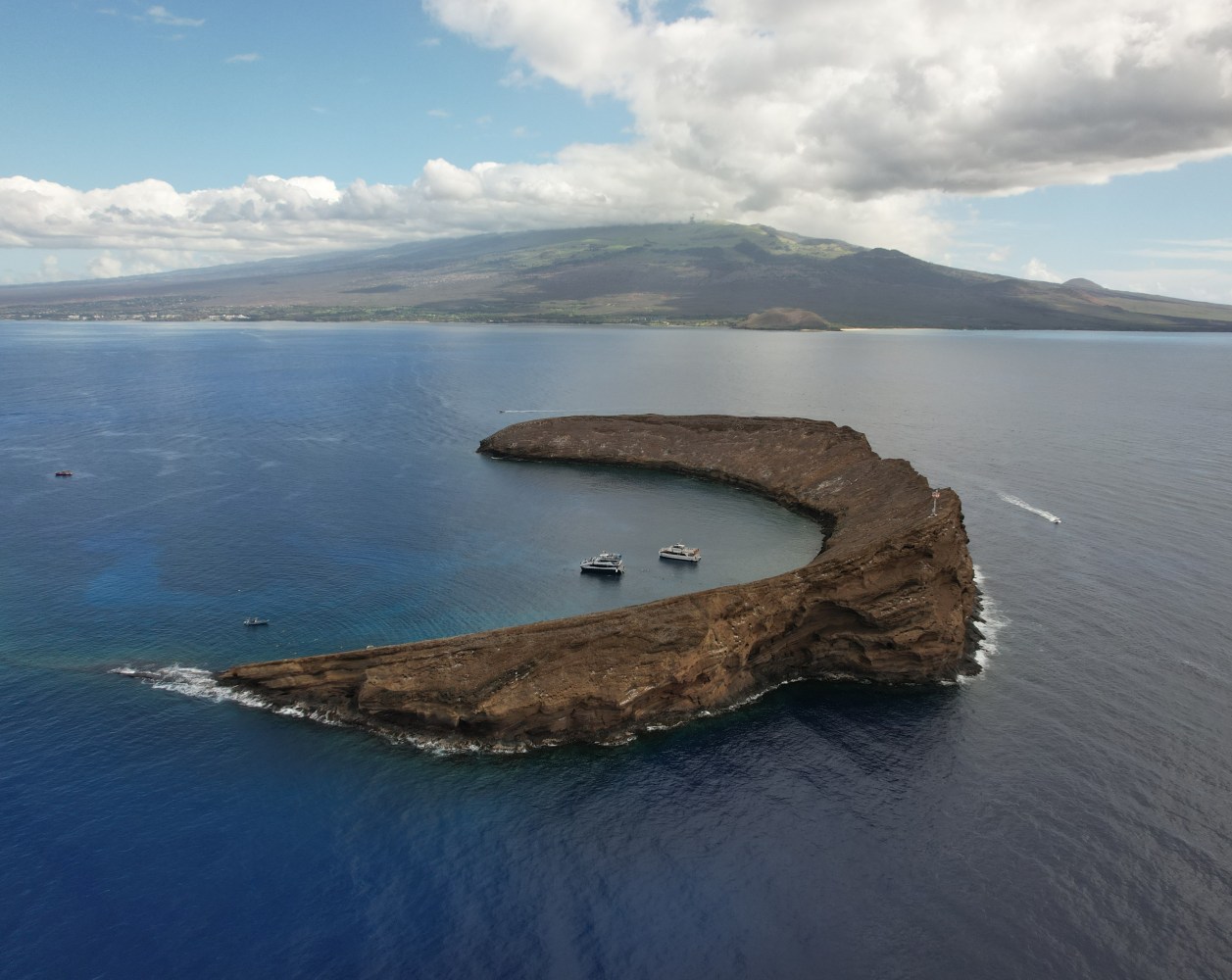Aerial view of Molokini crater during a snorkel tour.