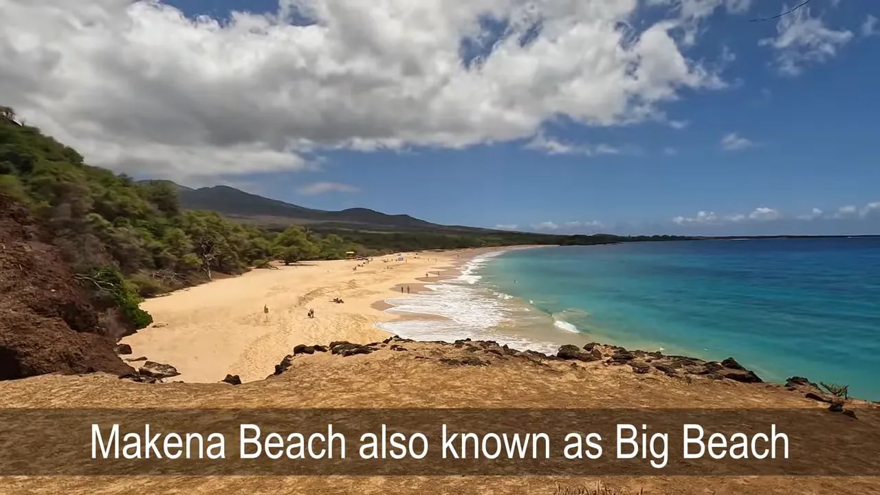 Wide sandy shoreline and turquoise water at Makena Beach